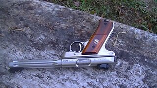 Shooting a penny with a pistol