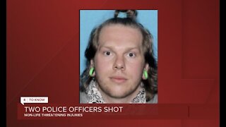 Suspect accused of shooting 2 police officers identified