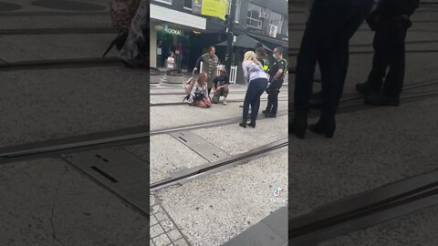 A Woman and her Puppy Block Trams Police and Lattes St Kilda Unvaxxed Picnic Revolution 23/10/21