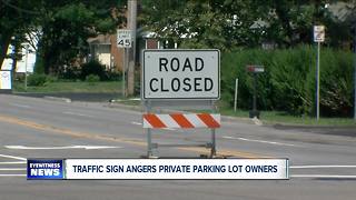 Traffic sign angers private parking lot owners