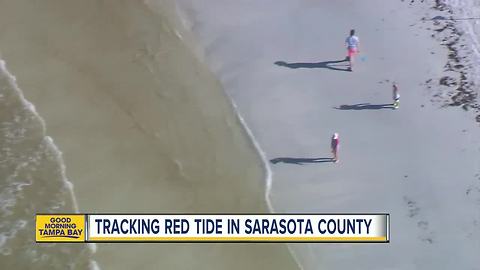 Beachgoers report effects of red tide
