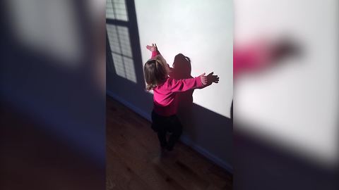 "Adorable Toddler Loves Her Shadow"
