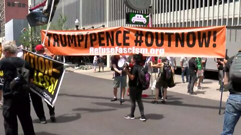 Demonstrators in downtown Tulsa before Trump rally