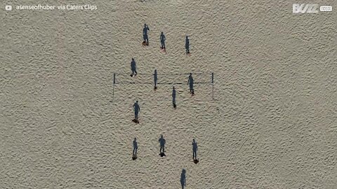 Stunning footage shows "shadows" playing volleyball