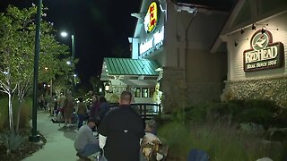 Shoppers line outside Tampa Bass Pro Shops for Black Friday