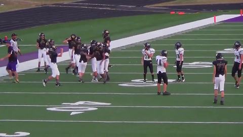 Opposing player lets Wisconsin boy with Down syndrome make his first tackle in football game