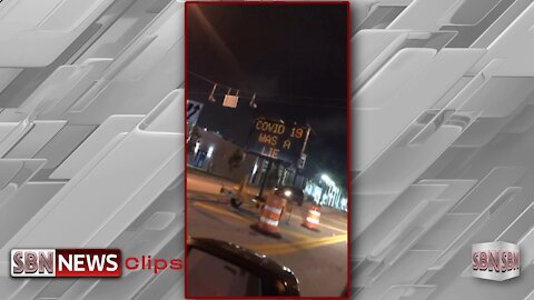 Video of Traffic Sign Stating Arrest Fauci, Covid19 Was A Lie and Vaccines Kill - 2112