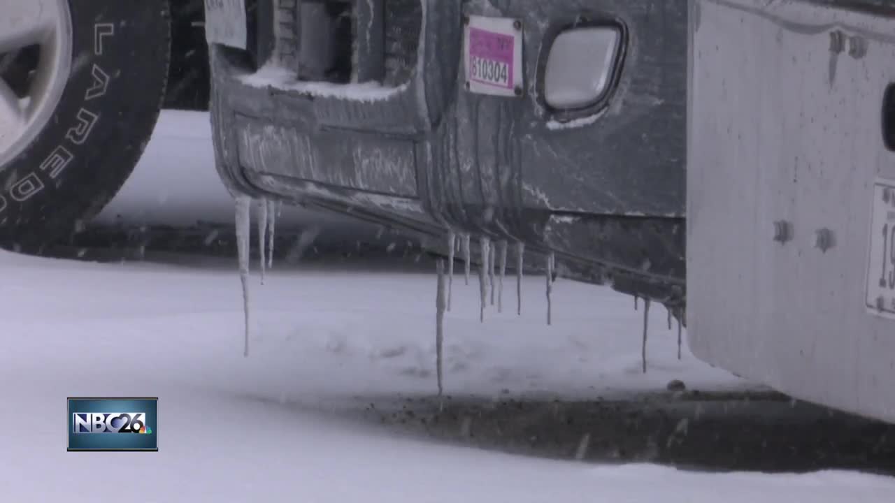 Semi truck drivers in the snow