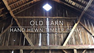 Old hand hewn timber frame barn