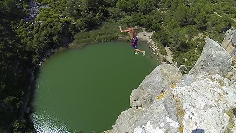 Adventurous Daredevil Jumps From 111 Feet Cliff Into Water