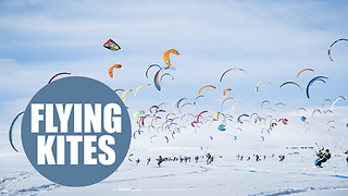 Hundreds battle it out in 105km snowkiting race in Norway