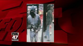 Surveillance photo released from armed robbery at video store