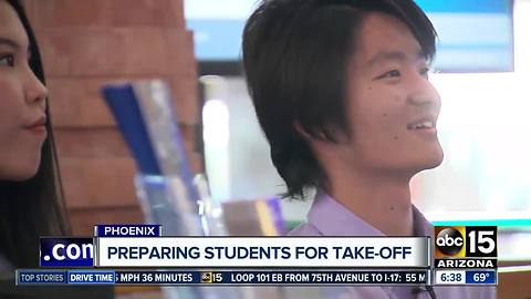 International students training at Sky Harbor information counters