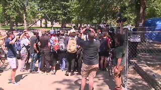 Protesters clash with Denver authorities during sweep of homeless camp in Lincoln Park