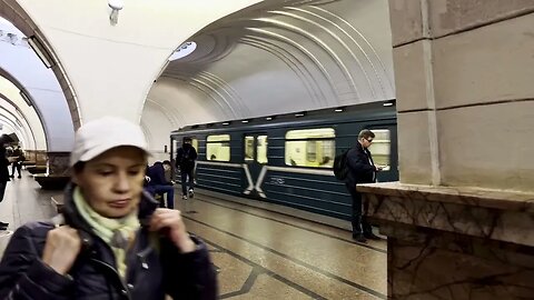 Walk through the Metro Stations Arbatskiya, Ploshad Revolutsy, Teatralniya, and Sokol!