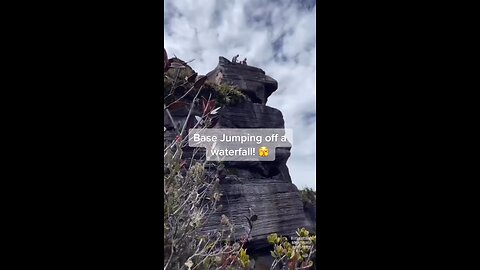 BASE JUMPING OFF A WATERFALL