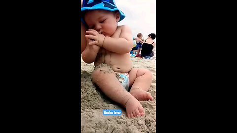Funny Baby reaction on the beach