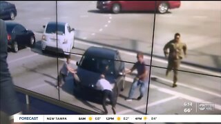 VIDEO: Florida drivers rush to help woman in distress at busy intersection