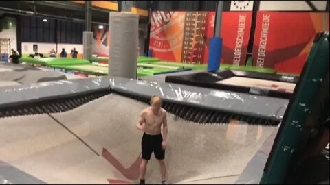 Man Jumps High on Trampoline and Does 5 Flips