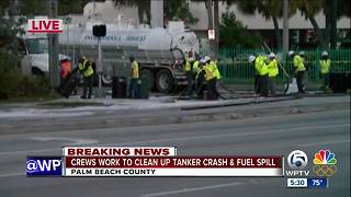 Crews work to clean up tanker crash and fuel spill