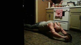 Standing Ab Wheel Pushups.