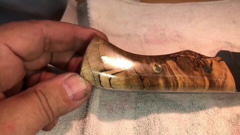 Shaping, sanding, and buffing out some knife handles.