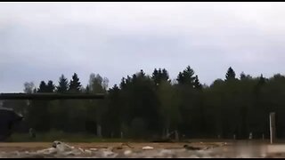 Shot of the T-90 tank firing in slow motion.