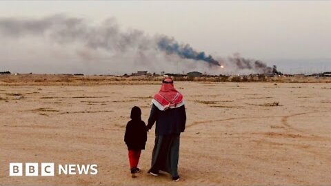 Life and death surrounded by gas flares in Iraq - BBC News