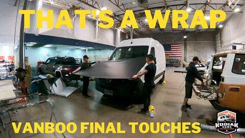 Vanboo a Mercedes Sprinter camper van conversion gets her final touches of a wrap on the hood & side