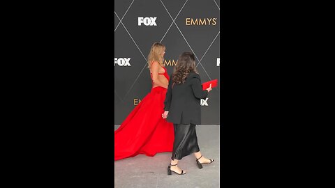 "Suki Waterhouse's Baby Bump Glam: Behind the Scenes of Her Custom Red Valentino Stunner at Emmys