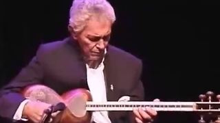 Farhang Sharif, an Iranian musician and renowned tar player