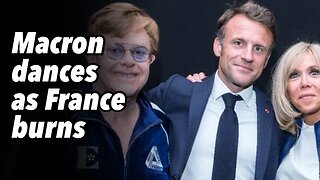 Macron dances as France burns