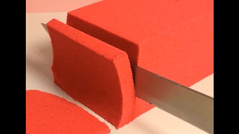 Satisfying compilation of kinetic sand being cut