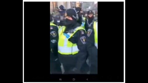 Canadian nazi police trample an old woman with a walker