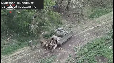 Combat footage of assault on enemy position with the support of M2A2 Bradley