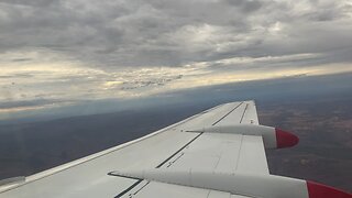 Qantaslink Fokker 100 landing runway 06