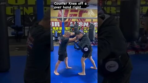 Number 2 Knee with the Thai pads and belly shield