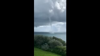 A remarkable waterspout was observed off the coast of the Isle of Wight, UK.