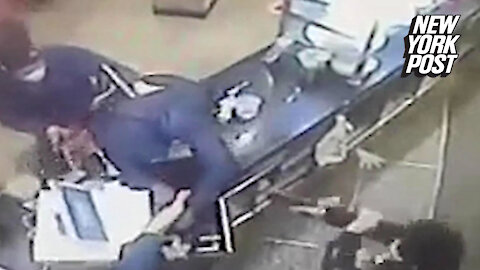 Chilling video shows 14-year-old boy shooting robber in face in Philadelphia pizzeria
