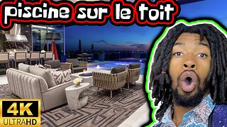 explorez un penthouse avec une piscine sur le toit.