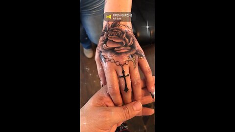 Hand rose tattoo