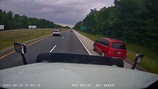 Reckless Driver Overtakes Truck