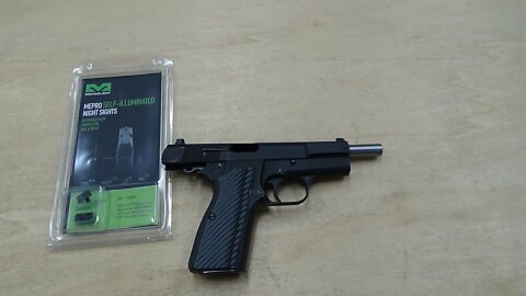 This Browning Hi-Power gets new night sights.