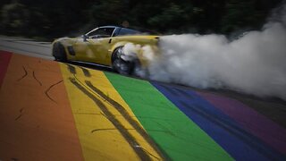 Burning Rubber On Gay Flag Mural