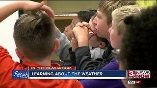 Middle schoolers learn about the weather