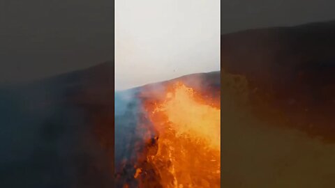 Unique footage taken from a drone right above an erupting volcano in Iceland