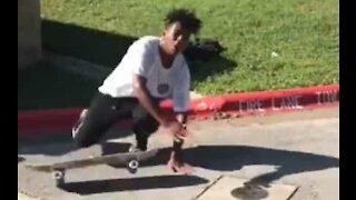 Unlucky skater boy gets skateboard in the neck