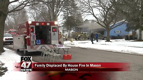 Crews battle house fire in Mason