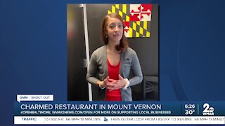 Charmed Restaurant in Mt. Vernon says "We're Open Baltimore!"