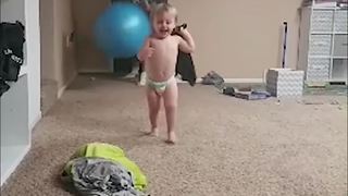 Dad Throws Yoga Ball at Toddler Boy